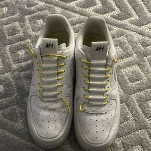 size 7 nike AF1 with yellow. Barely worn. Super cute and comfy.